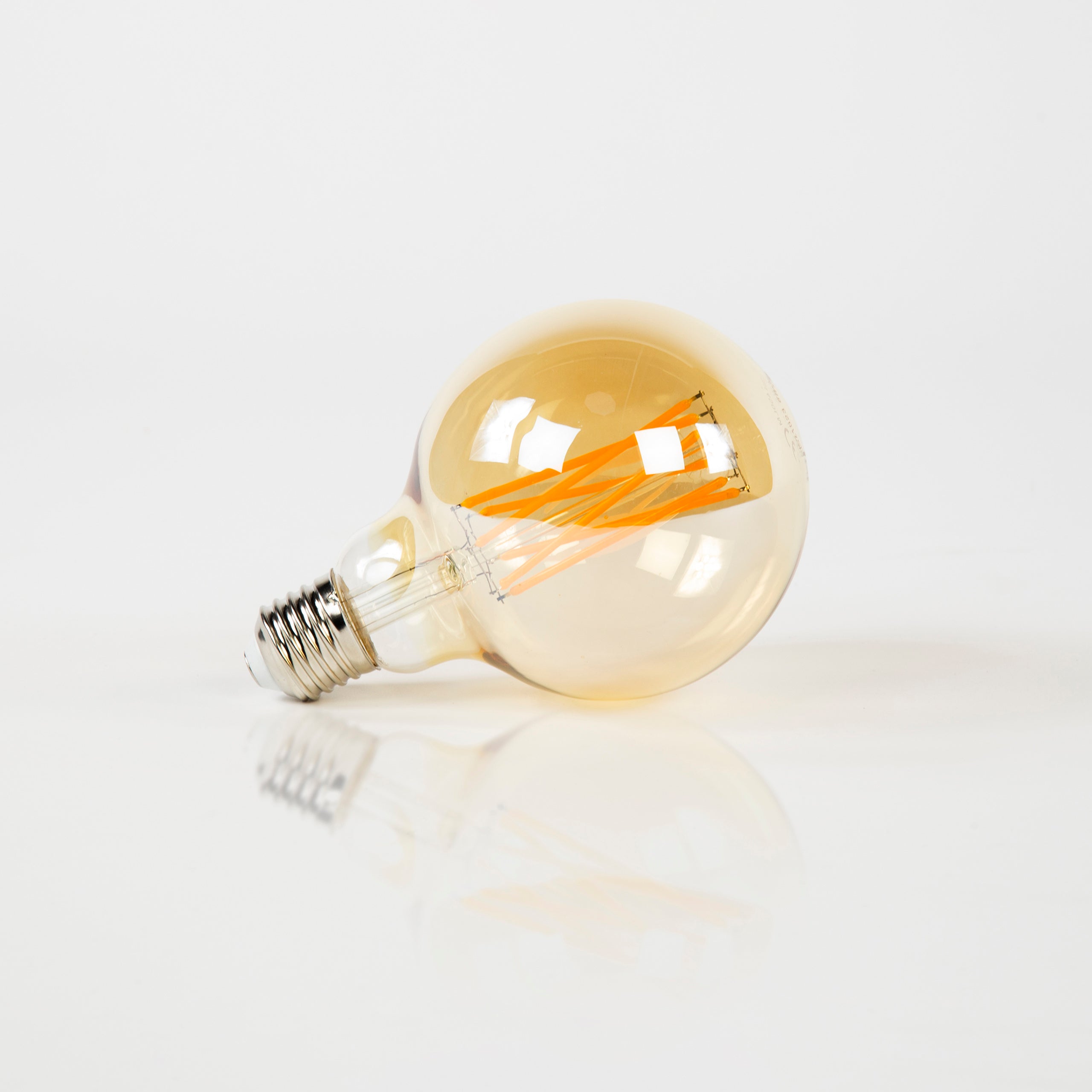 LED-Glühlampe Rara – G95-E27 mit amberfarbenem Glas