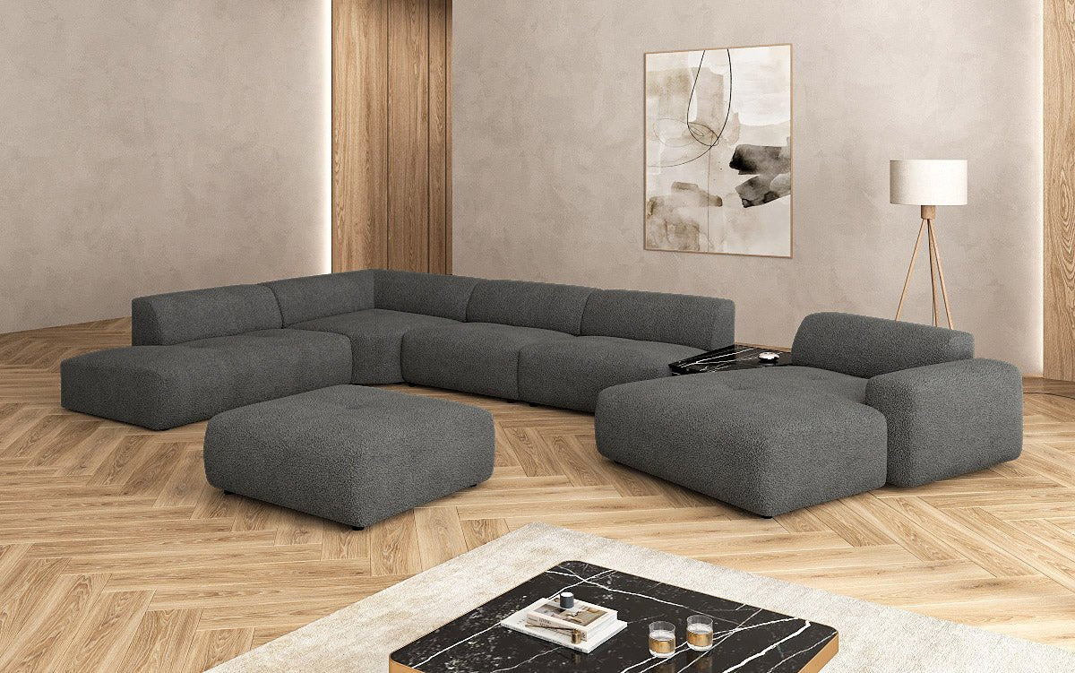 Designer Wohnlandschaft Calm mit Beistellhocker in Bouclé