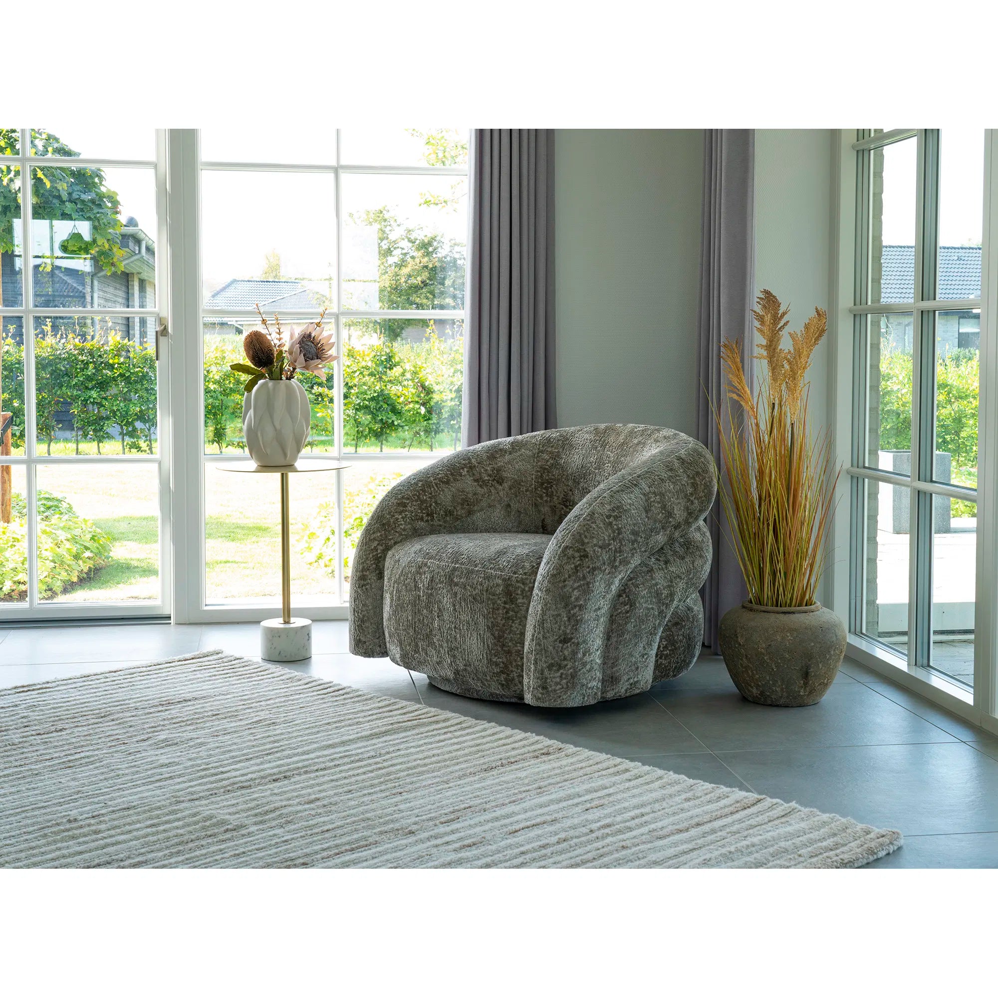 Designer sofa-lænestol Korfu med drejefunktion i Sand Bouclé