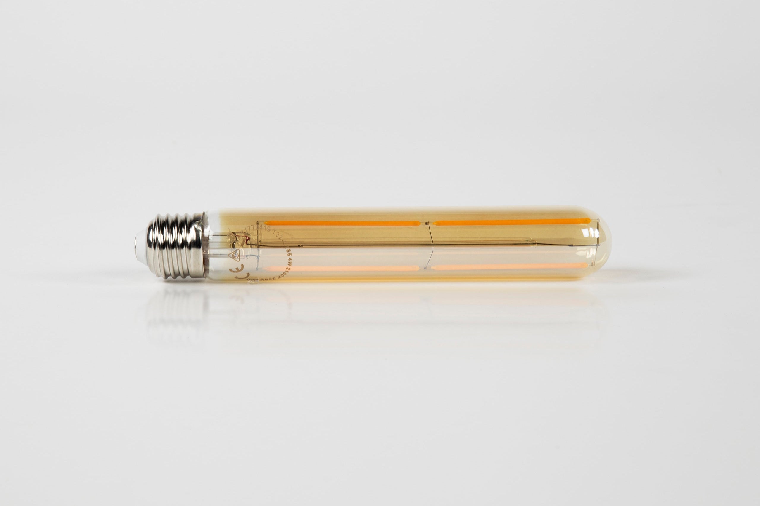 LED-Glühlampe Tavio – T32-E27 in Röhrenform mit amberfarbenem Glas