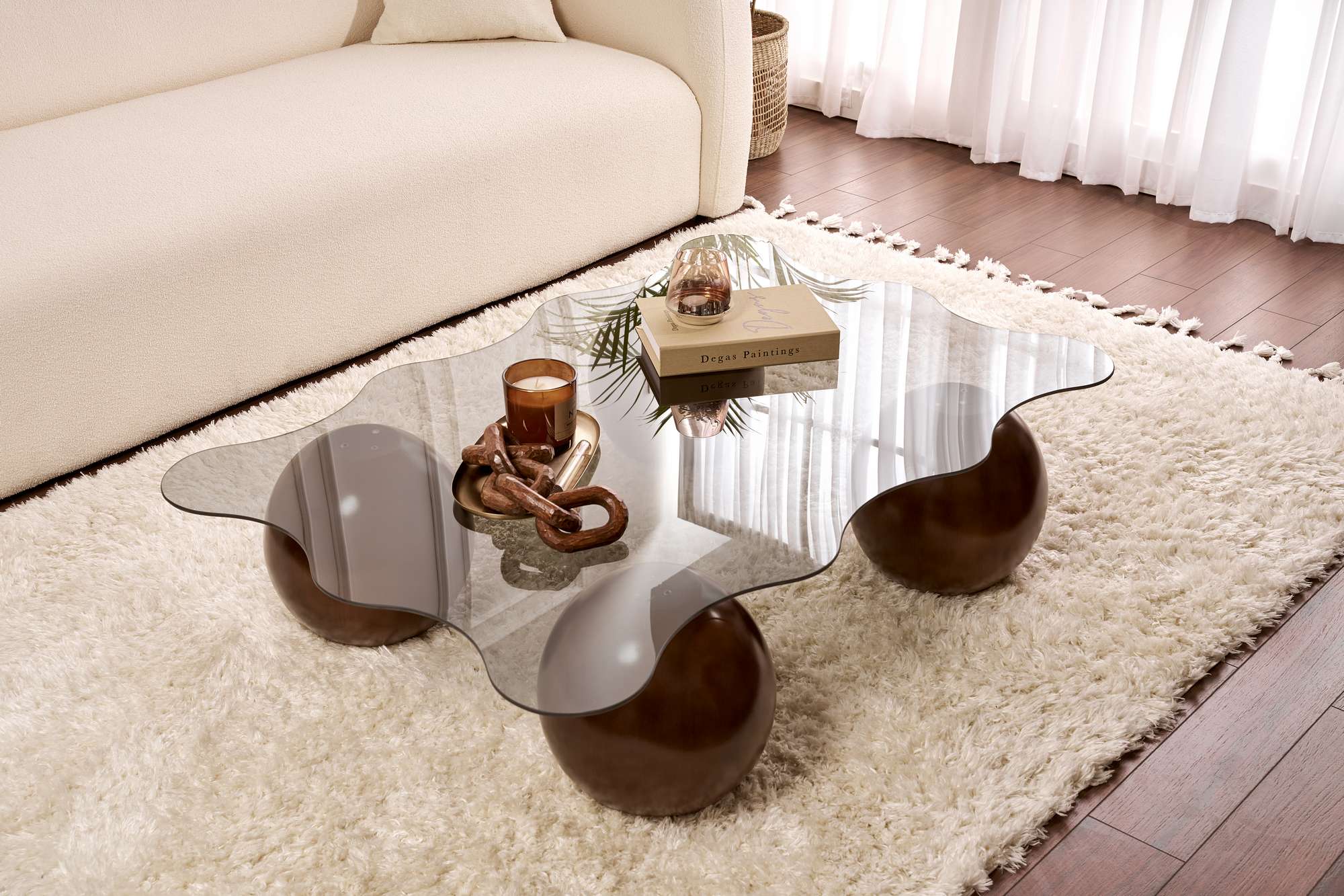 Sofabord Trevano - hærdet glasbordplade med bølgesilhuet