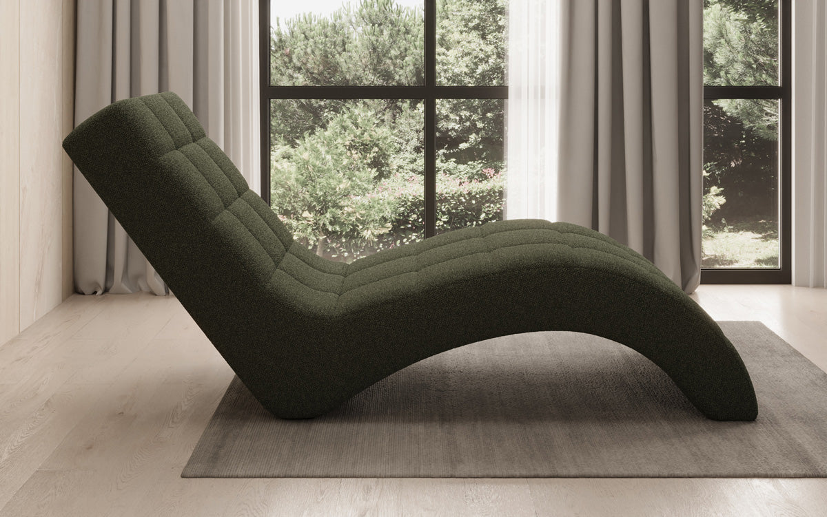 Designer afslapningsstol Nela i Bouclé