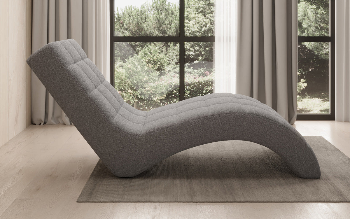 Designer afslapningsstol Nela i Bouclé